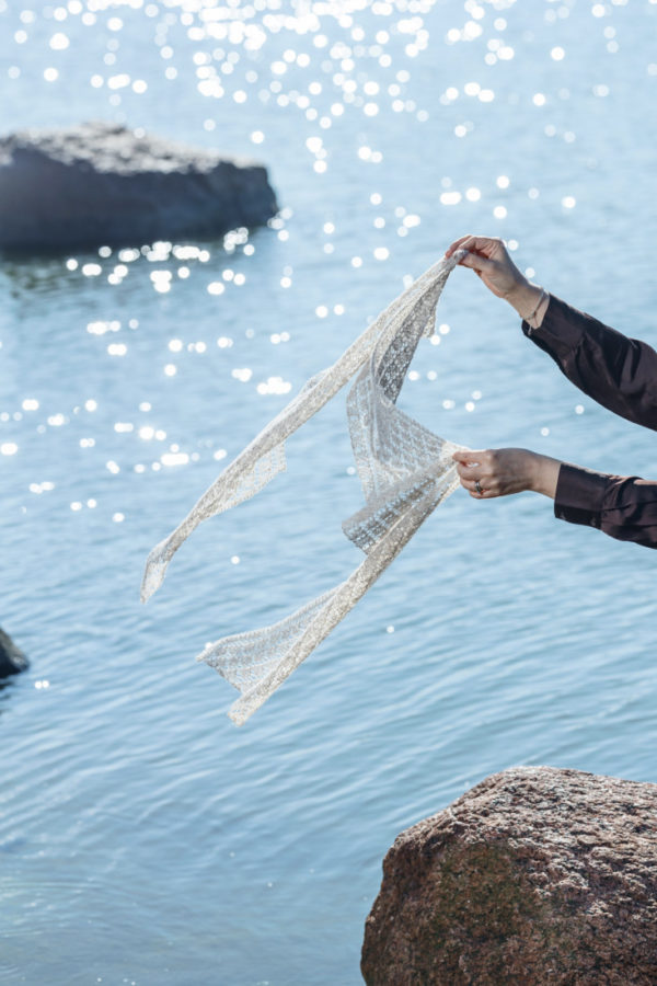 Tranquil – Bias rectangle scarf knitting pattern with simple lace and garter stitch.