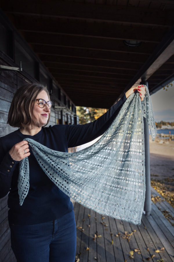 Rooted shawl knitting pattern for one skein of fingering weight yarn. Unisex triangle lace shawl.