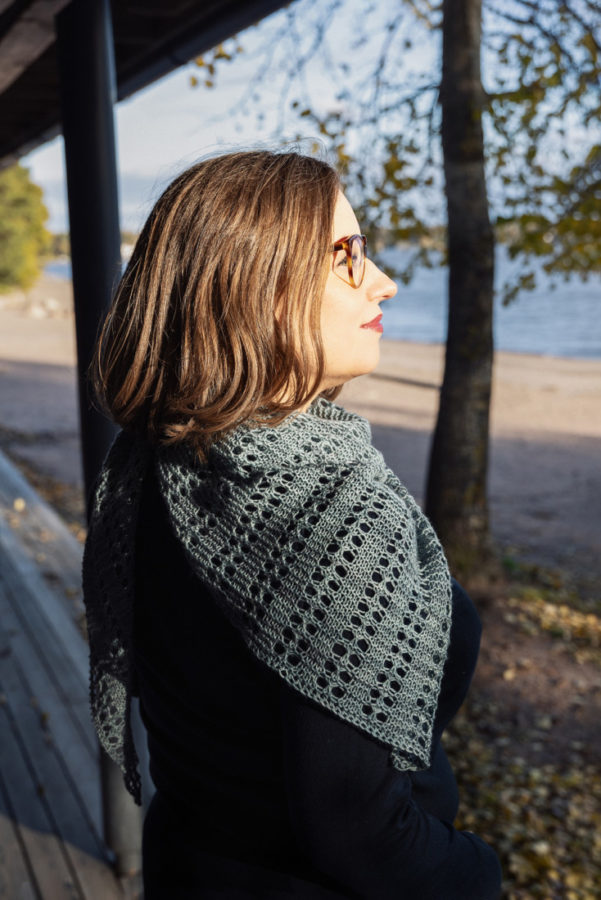 Rooted shawl knitting pattern for one skein of fingering weight yarn. Unisex triangle lace shawl.